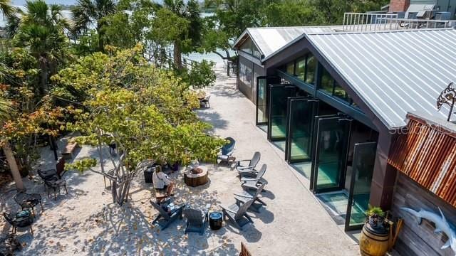 exterior space with a patio area and a fire pit