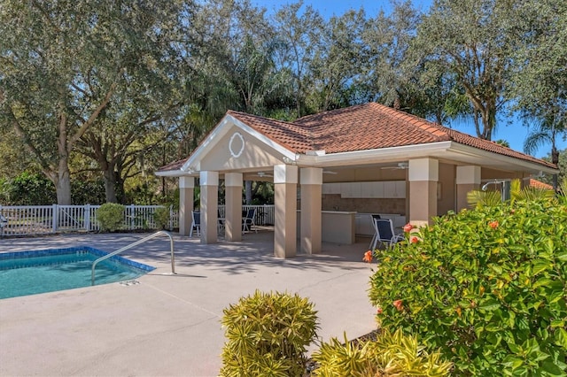 view of pool with a gazebo, area for grilling, and a patio