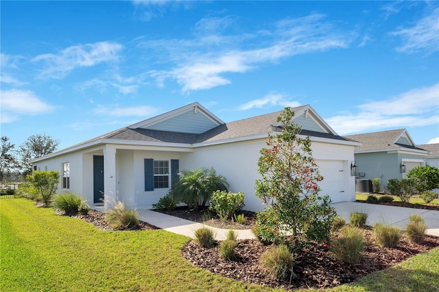 ranch-style house with a garage and a front lawn