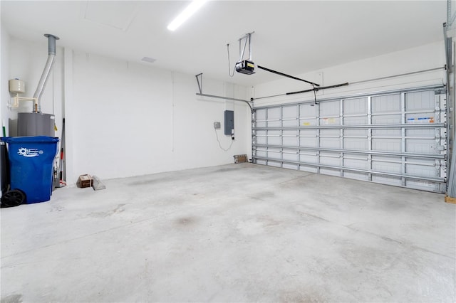 garage featuring electric panel, water heater, and a garage door opener