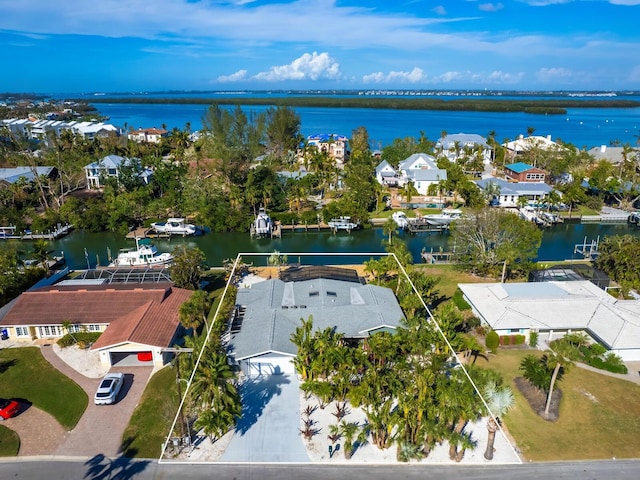 bird's eye view with a water view