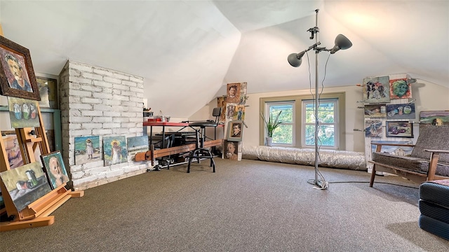 office space featuring carpet floors and lofted ceiling