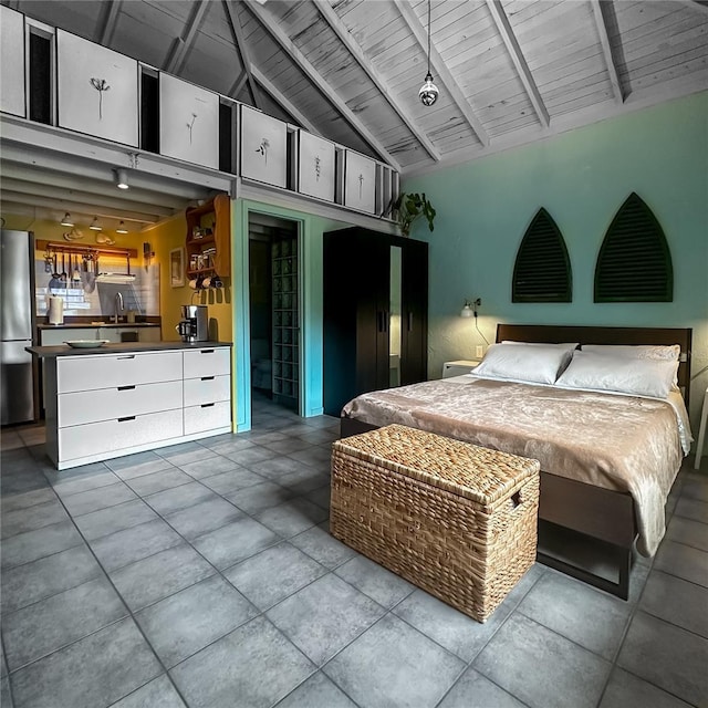 bedroom with wooden ceiling, high vaulted ceiling, sink, stainless steel fridge, and beamed ceiling