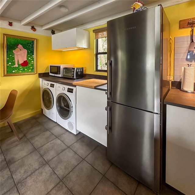 laundry area with separate washer and dryer