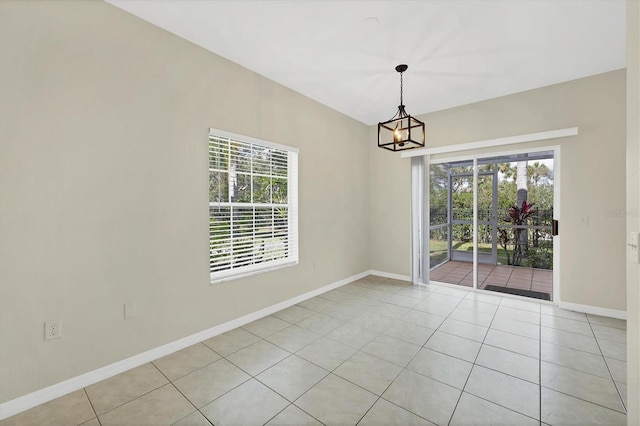 7664 Plantation Cir, Bradenton, FL 34201 - unfurnished dining area with a chandelier, light tile patterned floors, and a wealth of natural light