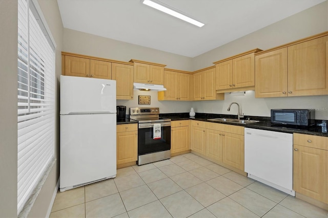 7664 Plantation Cir, Bradenton, FL 34201 - kitchen featuring light brown cabinetry, white appliances, light tile patterned floors, and sink