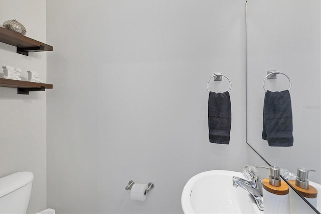 7664 Plantation Cir, Bradenton, FL 34201 - bathroom featuring toilet and sink