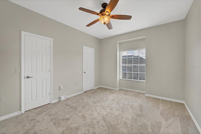 7664 Plantation Cir, Bradenton, FL 34201 - spare room with ceiling fan and light colored carpet