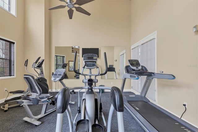 7664 Plantation Cir, Bradenton, FL 34201 - exercise room with ceiling fan and a high ceiling
