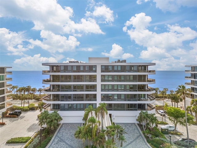 view of building exterior with a water view