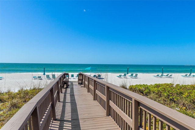 property view of water featuring a beach view