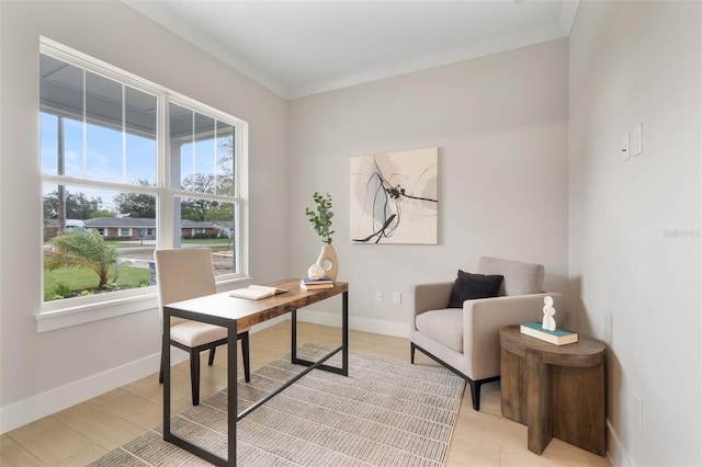 office area with ornamental molding and baseboards