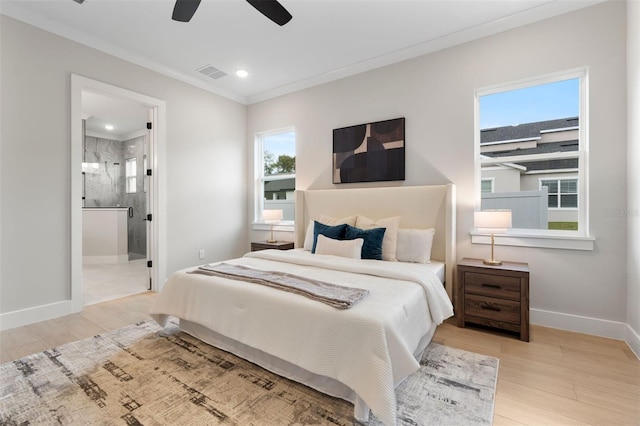 bedroom featuring crown molding, recessed lighting, visible vents, wood finished floors, and baseboards