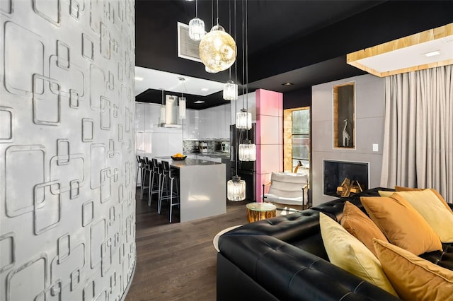 living room featuring dark hardwood / wood-style flooring