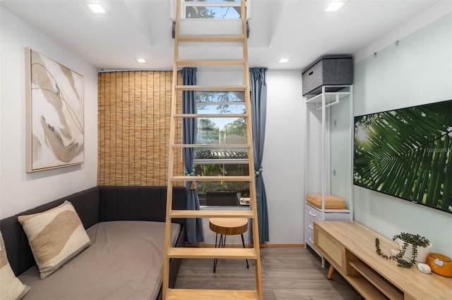 sitting room with hardwood / wood-style floors