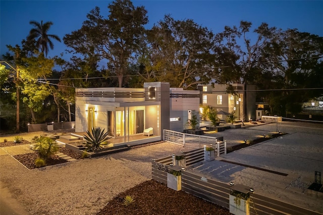 view of back house at night