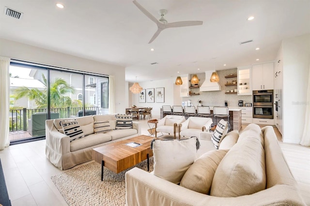 living room with ceiling fan