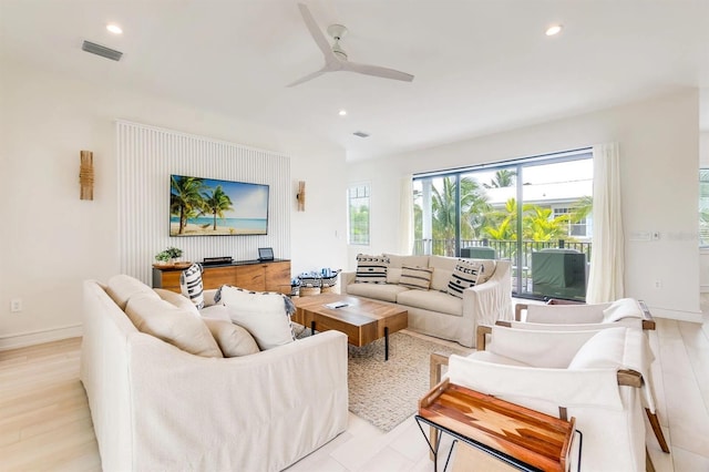 living room featuring ceiling fan