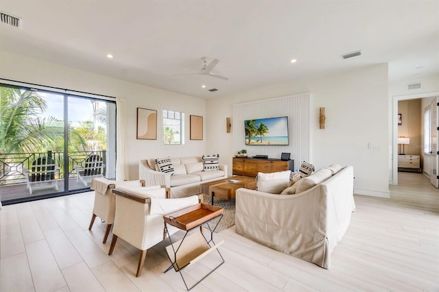 living room featuring ceiling fan