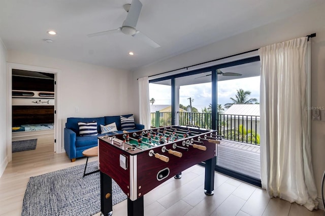 game room with ceiling fan