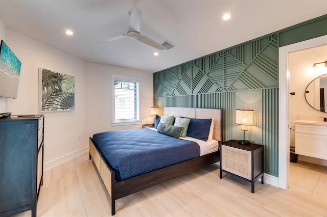 bedroom featuring ceiling fan and light hardwood / wood-style flooring