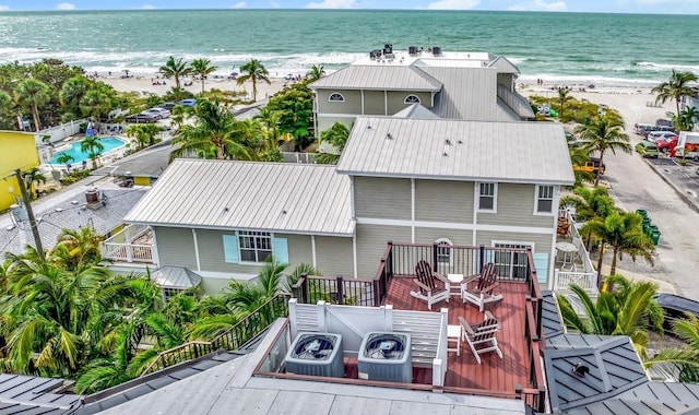 aerial view featuring a water view and a view of the beach