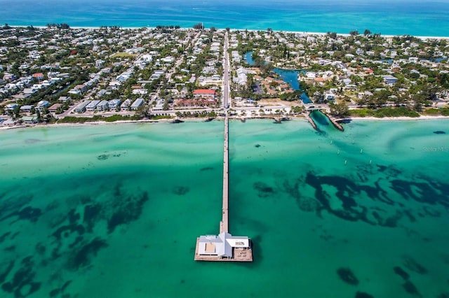 bird's eye view with a view of the beach and a water view