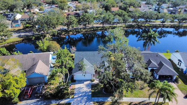 drone / aerial view with a water view