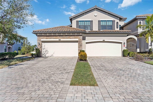 mediterranean / spanish-style house featuring a garage