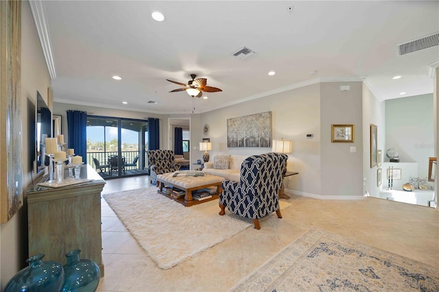 living room featuring light tile patterned floors, ceiling fan, and crown molding