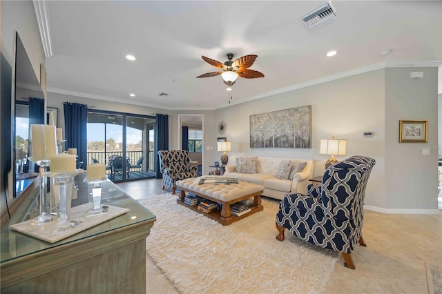 living room featuring ceiling fan, light tile patterned flooring, and ornamental molding