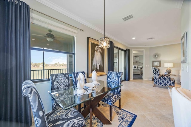 tiled dining room with ceiling fan with notable chandelier and crown molding