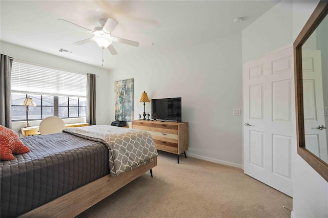 carpeted bedroom featuring ceiling fan