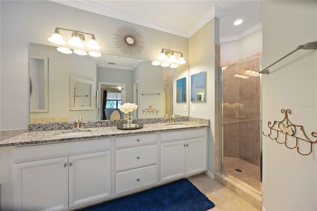 bathroom featuring tile patterned floors, vanity, an enclosed shower, and ornamental molding