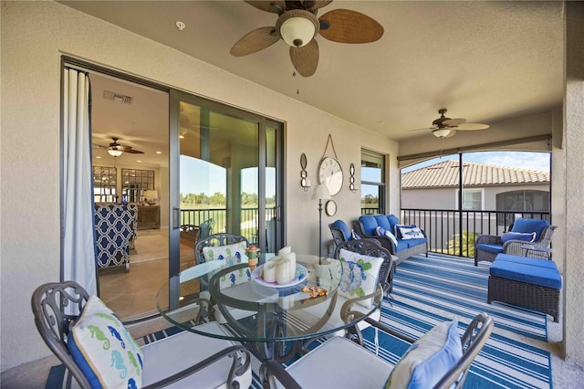 view of patio / terrace featuring outdoor lounge area and ceiling fan