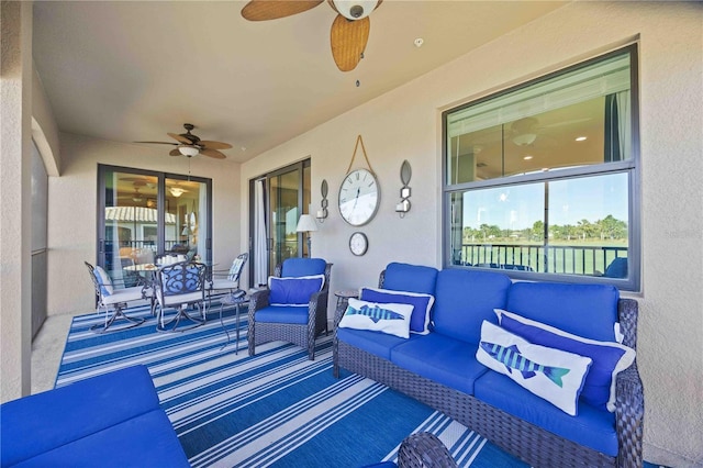 view of patio featuring outdoor lounge area and ceiling fan