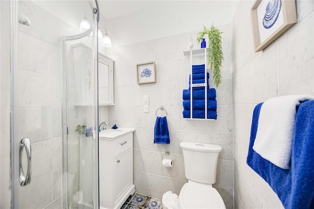 bathroom featuring vanity, toilet, and walk in shower