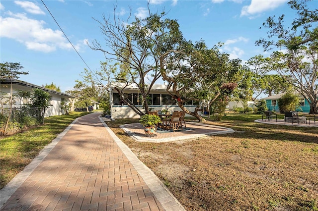 exterior space featuring a front yard