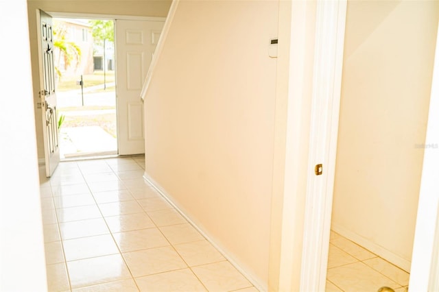 731 Cristelle Jean Dr, Ruskin, FL 33570 - hall with light tile patterned flooring and baseboards