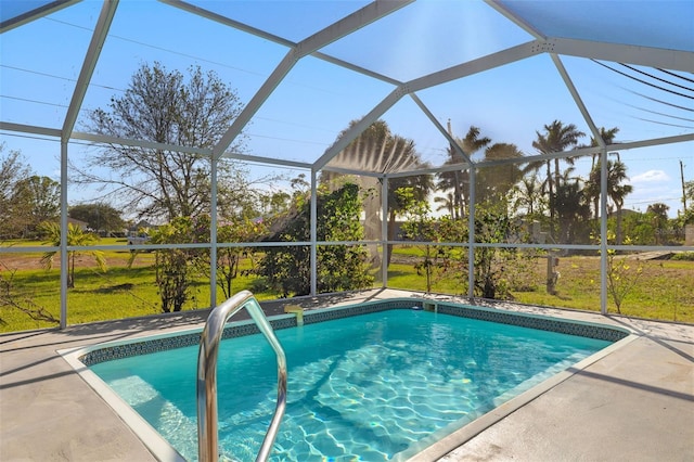 view of pool featuring glass enclosure