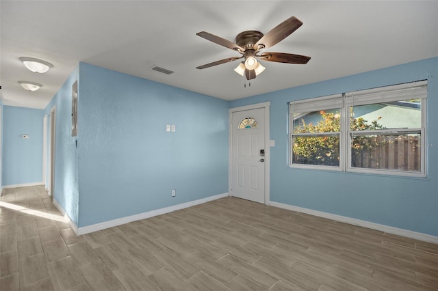 foyer with ceiling fan