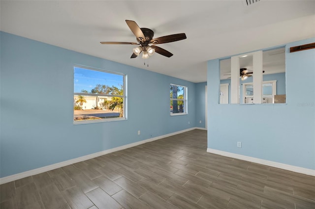 spare room featuring ceiling fan