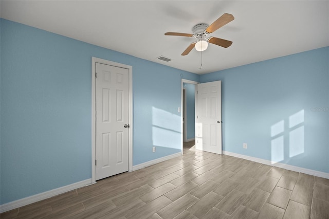 empty room featuring ceiling fan