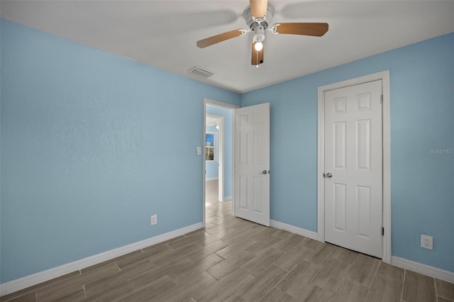 unfurnished bedroom with ceiling fan