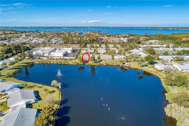 aerial view with a water view and a residential view