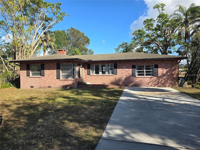 single story home with a front lawn