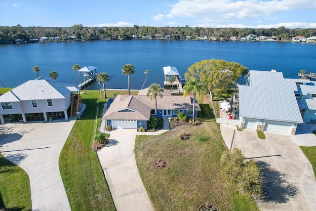 drone / aerial view with a water view