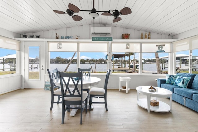 sunroom / solarium featuring ceiling fan, an AC wall unit, wood ceiling, and lofted ceiling