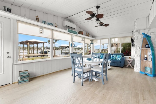 sunroom / solarium with a wall mounted air conditioner, ceiling fan, wood ceiling, and vaulted ceiling