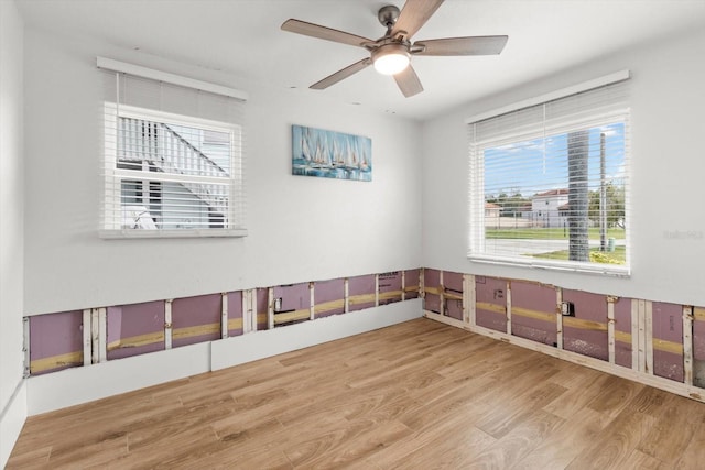 spare room featuring ceiling fan and wood-type flooring